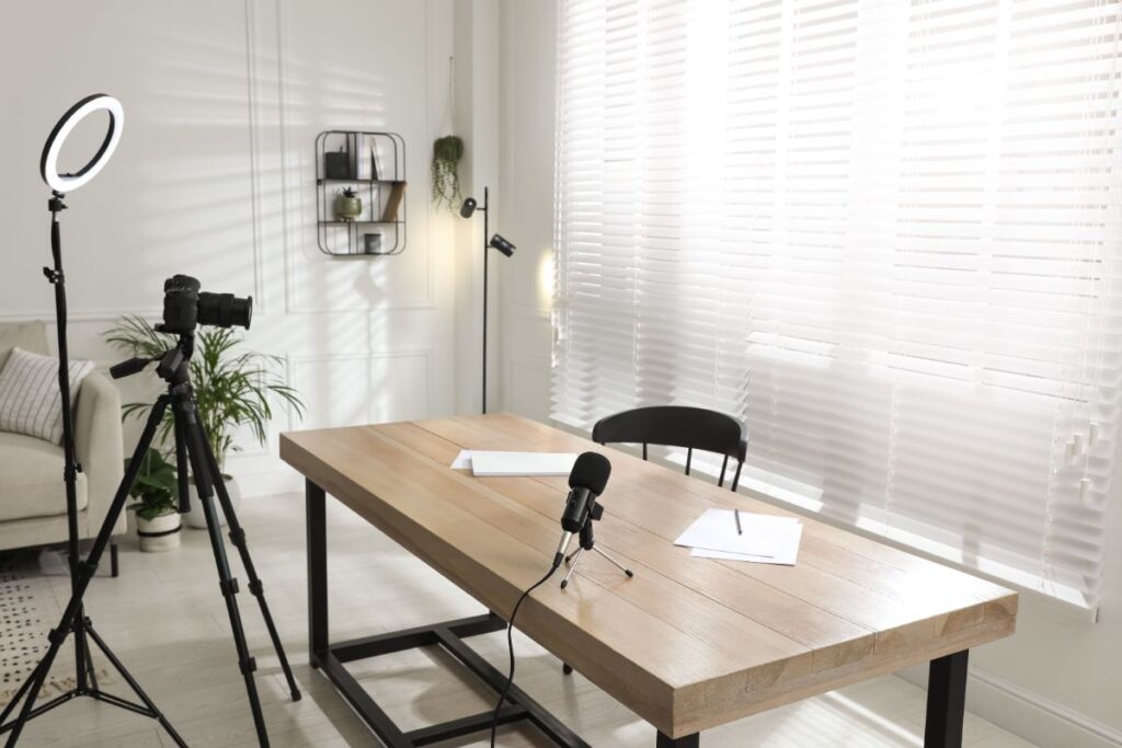 An office set up with a camera, microphone and lighting for media training